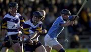 26 November 2000; Eddie O'Dwyer of UCD is tackled by John Hoyne of Graigue Ballycallan during the AIB Leinster Senior Hurling Championship Final between Graigue Ballycallan and University College Dublin at Nowlan Park in Kilkenny. Photo by Ray McManus/Sportsfile