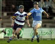 26 November 2000; Pat Fitzgerald of UCD races clear of Denis Byrne of Graigue Ballycallan during the AIB Leinster Senior Hurling Championship Final between Graigue Ballycallan and University College Dublin at Nowlan Park in Kilkenny. Photo by Ray McManus/Sportsfile