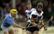 26 November 2000; Brendan Murphy of UCD is tackled by Tomas McCluskey of Graigue Ballycallan during the AIB Leinster Senior Hurling Championship Final between Graigue Ballycallan and University College Dublin at Nowlan Park in Kilkenny. Photo by Ray McManus/Sportsfile