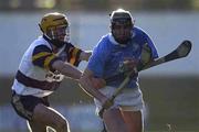 26 November 2000; Eddie Brennan of Graigue Ballycallan in action against Hugh Flannery of UCD during the AIB Leinster Senior Hurling Championship Final between Graigue Ballycallan and University College Dublin at Nowlan Park in Kilkenny. Photo by Ray McManus/Sportsfile