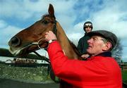 1 December 2000; Horse trainer, Arthur Moore, with Native Upmanship during a visit to the Rathangan stables in Kildare. Photo by David Maher/Sportsfile