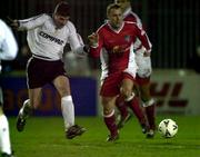 1 December 2000; Paul Byrne of St.Patrick's Athletic in action against Colin Fortune of Galway United during the Eircom League Premier Division match betweem St Patrick's Athletic and Galway United. Photo by David Maher/Sportsfile