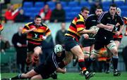 2 December 2000; Aidan McCullen of Lansdowne is tackled by Luke Hammond of Terenure during the AIB League Division 1 match between Lansdowne and Terenure at Lansdowne Road in Dublin. Photo by David Maher/Sportsfile