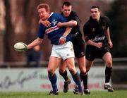 2 December 2000; Denis Hickie of St Mary's is tackled by Finbar Hogan of Young Munster during the AIB League Division 1 match betweem St Mary's College and Young Munster at Templeville Road in Dublin. Photo by Brendan Moran/Sportsfile