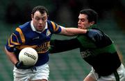 3 December 2000; Seamus Moynihan of Glenflesk holds off the challenge of Martin Cronin of Nemo Rangers during the AIB Munster Club Football Championship Final match between Nemo Rangers and Glenflesk at the Gaelic Grounds in Limerick. Photo by Brendan Moran/Sportsfile