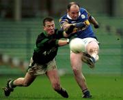3 December 2000; David O'Donoghue of Glenflesk in action against Declan Creedon of Nemo Rangers during the AIB Munster Club Football Championship Final match between Nemo Rangers and Glenflesk at the Gaelic Grounds in Limerick. Photo by Brendan Moran/Sportsfile