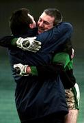 3 December 2000; Nemo Rangers captain Larry Kavanagh celebrates at the final whistle with selector Jimmy Kerrigan following the AIB Munster Club Football Championship Final match between Nemo Rangers and Glenflesk at the Gaelic Grounds in Limerick. Photo by Brendan Moran/Sportsfile