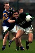 3 December 2000; Martin Cronin of Nemo Rangers in action against Eric O'Donoghue of Glenflesk during the AIB Munster Club Football Championship Final match between Nemo Rangers and Glenflesk at the Gaelic Grounds in Limerick. Photo by Brendan Moran/Sportsfile