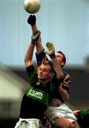 3 December 2000; Dermot Kelly, Glenflesk beats Kieran Connelly, Nemo Rangers to the high ball during the AIB Munster Club Football Championship Final match between Nemo Rangers and Glenflesk at the Gaelic Grounds in Limerick. Photo by Brendan Moran/Sportsfile