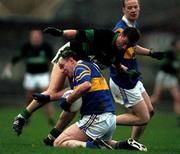 3 December 2000; David O'Donoghue of Glenflesk is put under pressure by Declan Creedon of Nemo Rangers during the AIB Munster Club Football Championship Final match between Nemo Rangers and Glenflesk at the Gaelic Grounds in Limerick. Photo by Brendan Moran/Sportsfile