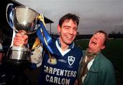 3 December 2000; Niall English of O'Hanrahans celebrates with his mother Theresa following AIB Leinster Club Football Championship Final match between O'Hanrahans and Na Fianna at O'Moore Park in Portlaoise. Photo by David Maher/Sportsfile