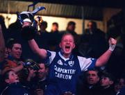 3 December 2000; Alan Bowe of O'Hanrahans celebrates with the Sean McCabe Cup after AIB Leinster Club Football Championship Final match between O'Hanrahans and Na Fianna at O'Moore Park in Portlaoise. Photo by; David Maher/Sportsfile