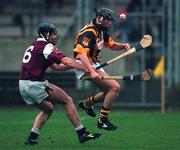 3 December 2000; Eddie Brennan of Kilkenny is tackled by Liam Hodgins of Galway during the 1999 Oireachtas Hurling Final between Galway and Kilkenny in Nenagh, Tipperary. Photo by Ray McManus/Sportsfile