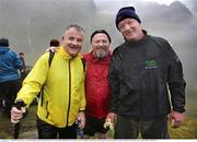 11 September 2015; Pictured are, from left to right, Darragh Scully, Ronan Scully, Gorta, and Irish rugby legend Mick Galwey, on their ascent to Carrauntoohil, MacGillycuddy's Reeks, during the Caps to the Summit in Aid of the Alan Kerins Project. Picture credit: Valerie O'Sullivan / SPORTSFILE