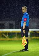 11 September 2015; Linesman Matthew Farrell in the rain during the game. Irish Daily Mail FAI Senior Cup, Quarter-Final, Bray Wanderers v Killester United, Carlisle Grounds, Bray, Co Wicklow. Picture credit: Piaras Ó Mídheach / SPORTSFILE