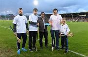 12 September 2015; Seanie O’Brien, 2nd from left, Patrickswell GAA Club, Limerick, and Gearoid Cullen, 2nd from right, Naomh Eanna GAA, Wexford, receive their prize for winning the half-time Crossbar Challenge from Marty Morrissey, in the company of other contestants Gary Molloy, left, Naomh Eanna GAA, Wexford, and Jamie Byrnes, Patrickswell GAA Club, Limerick. Bord Gais Energy GAA Hurling All-Ireland U21 Championship Final, Limerick v Wexford, Semple Stadium, Thurles, Co. Tipperary. Picture credit: Brendan Moran / SPORTSFILE