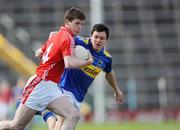 28 March 2009; David Goold, Cork, in action against Ciaran McDonald, Tipperary. Cadbury Munster U21 Football Championship Final, Tipperary v Cork, Semple Stadium, Thurles, Co. Tipperary. Picture credit: Ray McManus / SPORTSFILE