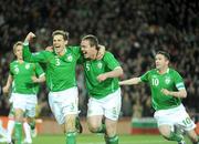 28 March 2009; Richard Dunne, 5, Republic of Ireland, celebrates after scoring the first goal of the game against Bulgaria with team-mates Kevin Kilbane and Robbie Keane. 2010 FIFA World Cup Qualifier, Republic of Ireland v Bulgaria, Croke Park, Dublin. Picture credit: Matt Browne / SPORTSFILE