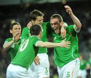 28 March 2009; Richard Dunne, 5, Republic of Ireland, celebrates after scoring the first goal of the game against Bulgaria with team-mates Keith Andrews, Kevin Kilbane and Robbie Keane . 2010 FIFA World Cup Qualifier, Republic of Ireland v Bulgaria, Croke Park, Dublin. Picture credit: Matt Browne / SPORTSFILE