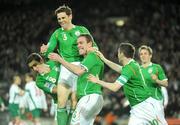 28 March 2009; Richard Dunne, 5, Republic of Ireland, celebrates after scoring the first goal of the game against Bulgaria with team-mates Keith Andrews, Kevin Kilbane and Robbie Keane. 2010 FIFA World Cup Qualifier, Republic of Ireland v Bulgaria, Croke Park, Dublin. Picture credit: Matt Browne / SPORTSFILE
