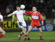28 March 2009; Paddy Bradley, Derry, in action against Conor Gormley, Tyrone. Allianz GAA NFL Division 1 Round 6, Healy Park, Omagh, Co. Tyrone. Picture credit: Oliver McVeigh / SPORTSFILE