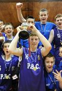 26 March 2009; Presentation Brothers College captain Ronan O'Sullivan lifts the cup surrounded by team-mates. U16C Boys - Schools League Finals, Colaiste An Chroi Naofa, Carrig na Bhear, Cork v Presentation Brothers College, Cork. National Basketball Arena, Tallaght, Dublin. Picture credit: Stephen McCarthy / SPORTSFILE