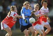 27 March 2009; Elaine Morris, Convent of Mercy, in action against Michelle Hartnett, left, and Elenor Ahern, Loretto. Pat the Baker Post Primary Schools Senior A Final, Loretto, Fermoy v Convent of Mercy, Roscommon, St Rynaghs, Banagher, Co. Offaly. Picture credit: Brian Lawless / SPORTSFILE