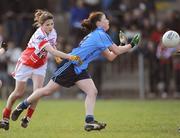 27 March 2009; Cliona McHugh, Convent of Mercy, in action against Mary O'Sullivan, Loretto. Pat the Baker Post Primary Schools Senior A Final, Loretto, Fermoy v Convent of Mercy, Roscommon, St Rynaghs, Banagher, Co. Offaly. Picture credit: Brian Lawless / SPORTSFILE