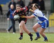 27 March 2009; Aisling Henry, Scoil Muire agus Padraig, in action against Georgina Browne, St Josephs. Pat the Baker Post Primary Schools Senior C Final, St Josephs, Abbeyfeale v Scoil Muire agus Padraig, Swinford, St Rynaghs, Banagher, Co. Offaly. Picture credit: Brian Lawless / SPORTSFILE