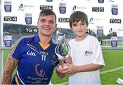 12 September 2015; Wicklow's Anthony Byrne is presented with the Bord Gais Energy Man of the Match award by Sean Mac Uilin, aged 8, from Mornington, Co. Meath, who won a competition to present the award through the Bord Gais Energy Rewards club. Bord Gais Energy GAA Hurling All-Ireland U21 B Championship Final, Meath v Wicklow, Semple Stadium, Thurles, Co. Tipperary. Picture credit: Diarmuid Greene / SPORTSFILE