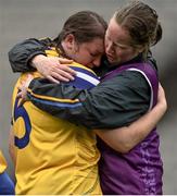 13 September 2015; A disappointed Susan Spillane, Roscommon, is consoled by a team official at the end of the game. Liberty Insurance All Ireland Premier Junior Camogie Championship Final, Laois v Roscommon. Croke Park, Dublin. Picture credit: David Maher / SPORTSFILE