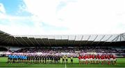 13 September 2015; Ospreys and Munster players observe a minute silence in memory of former All Black and Ospreys player Jerry Collins. Guinness PRO12, Round 2, Ospreys v Munster. Liberty Stadium, Swansea, Wales. Picture credit: Gareth Everett / SPORTSFILE