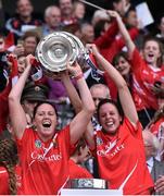 13 September 2015; Cork players Gemma O'Connor, left, and Orla Cotter, lift the O'Duffy cup. Liberty Insurance All Ireland Senior Camogie Championship Final, Cork v Galway. Croke Park, Dublin. Picture credit: David Maher / SPORTSFILE