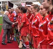 13 September 2015; Members of the Cork team are presented to The President of Ireland Michael D. Higgins before the start of the game. Liberty Insurance All Ireland Senior Camogie Championship Final, Cork v Galway. Croke Park, Dublin. Picture credit: David Maher / SPORTSFILE