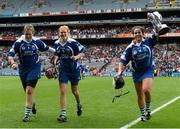 13 September 2015; Waterford players from left, Deirdre Brennan, Beth Carton and Niamh Rockett celebrate at the end of the game. All Ireland Intermediate Camogie Championship Final, Kildare v Waterford. Croke Park, Dublin. Picture credit: David Maher / SPORTSFILE