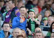 12 September 2015; Limerick supporters Scott Ryan Coleman, aged 9, along with his father Gavin Coleman, from Pallasgreen, Co. Limerick, before the game. Bord Gais Energy GAA Hurling All-Ireland U21 Championship Final, Limerick v Wexford, Semple Stadium, Thurles, Co. Tipperary. Picture credit: Diarmuid Greene / SPORTSFILE