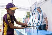 12 September 2015; Joshua Power, from St Abban's GAA club, Adamstown, Co. Wexford, tries his hand at the buzzer game in the Bord Gais Energy fanzone before the game. Bord Gais Energy GAA Hurling All-Ireland U21 Championship Final, Limerick v Wexford, Semple Stadium, Thurles, Co. Tipperary. Picture credit: Diarmuid Greene / SPORTSFILE