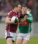 29 March 2009; Damien Burke, Galway, in action against Michael Sweeney, Mayo. Allianz GAA NFL Division 1, Round 6, Galway v Mayo, Tuam Stadium, Tuam, Co.Galway. Photo by Sportsfile