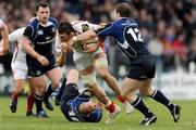 29 March 2009; Ryan Caldwell, Ulster, is tackled by Gordon D'Arcy, 12, and Felipe Contepomi, Leinster. Magners League, Leinster v Ulster. RDS, Dublin. Picture credit: Stephen McCarthy / SPORTSFILE