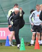 30 March 2009; Republic of Ireland manager Giovanni Trapattoni stretching during squad training ahead of their 2010 FIFA World Cup Qualifier against Italy on Wednesday. Gannon Park, Malahide, Co. Dublin. Picture credit: David Maher / SPORTSFILE