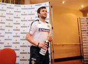 30 March 2009; Northern Ireland's Damien Johnston, with a magnum of Champagne to celebrate his 50th Cap which he earned against Poland in the 2010 FIFA World Cup Qualifier match on Saturday. Hilton Hotel, Templepatrick, Co. Antrim. Picture credit: Oliver McVeigh / SPORTSFILE
