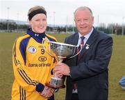 29 March 2009; DCU Captain, Fiona McHale, receives the O'Connor cup from Pat Quill, Ladies GAA President. O'Connor Cup Final, University of DCU v University of Limerick, UUJ, Jordanstown, Shore Road, Newtownabbey, Co. Antrim. Picture credit: Oliver McVeigh / SPORTSFILE