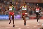 30 August 2015; Silver medalist Senbere Teferi of Ethiopia, left, and bronze medalist Genzebe Dibaba of Ethiopia cross the line during the Women's 5000m final. IAAF World Athletics Championships Beijing 2015 - Day 9, National Stadium, Beijing, China. Picture credit: Stephen McCarthy / SPORTSFILE
