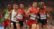 30 August 2015; Athletes, from left, Abdalaati Iguider of Morocco, Matthew Centrowitz of USA and Elijah Motonei Manangoi of Kenya during the final of the Men's 1500m event. IAAF World Athletics Championships Beijing 2015 - Day 9, National Stadium, Beijing, China. Picture credit: Stephen McCarthy / SPORTSFILE