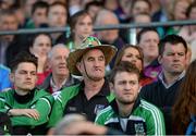 12 September 2015; Limerick supporters including Pat Doyle, from Garryspillane GAA club, Co. Limerick, look on during the game. Bord Gais Energy GAA Hurling All-Ireland U21 Championship Final, Limerick v Wexford, Semple Stadium, Thurles, Co. Tipperary. Picture credit: Diarmuid Greene / SPORTSFILE
