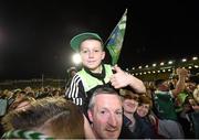 12 September 2015; Limerick supporters Scott Ryan Coleman, aged 9, along with his grandfather Mike Coleman, from Pallasgreen, Co. Limerick, after the game. Bord Gais Energy GAA Hurling All-Ireland U21 Championship Final, Limerick v Wexford, Semple Stadium, Thurles, Co. Tipperary. Picture credit: Diarmuid Greene / SPORTSFILE