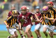 6 September 2015; Adam English, Doon CBS, Co. Limerick, representing Galway, in action against Niall McGarel, St John's PS, Ballymena, Co. Antrim, left, and Caolan O'Neill, Scoil Iosagain NS, Buncrana, Co. Donegal, representing Kilkenny, during the Cumann na mBunscoil INTO Respect Exhibition Go Games 2015 at Kilkenny v Galway - GAA Hurling All-Ireland Senior Championship Final. Croke Park, Dublin Picture credit: Diarmuid Greene / SPORTSFILE