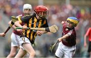 6 September 2015; Mairtin Gannon, Scoil Mhuire Lourdes BNS, Mooncoin, Co. Kilkenny, in action against Cian O'Shaughnessy, Ballinakill NS, Co. Laois, representing Galway, during the Cumann na mBunscoil INTO Respect Exhibition Go Games 2015 at Kilkenny v Galway - GAA Hurling All-Ireland Senior Championship Final. Croke Park, Dublin Picture credit: Diarmuid Greene / SPORTSFILE