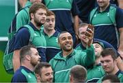 16 September 2015; Ireland's Simon Zebo takes a picture surrounded by team-mates at Dublin Airport ahead of their departure for the 2015 Rugby World Cup. Terminal 2, Dublin Airport, Dublin. Picture credit: Stephen McCarthy / SPORTSFILE