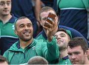 16 September 2015; Ireland's Simon Zebo takes a picture surrounded by team-mates Paddy Jackson, Conor Murray and Sean Cronin at Dublin Airport ahead of their departure for the 2015 Rugby World Cup. Terminal 2, Dublin Airport, Dublin. Picture credit: Stephen McCarthy / SPORTSFILE
